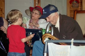 Playing with his first grandson